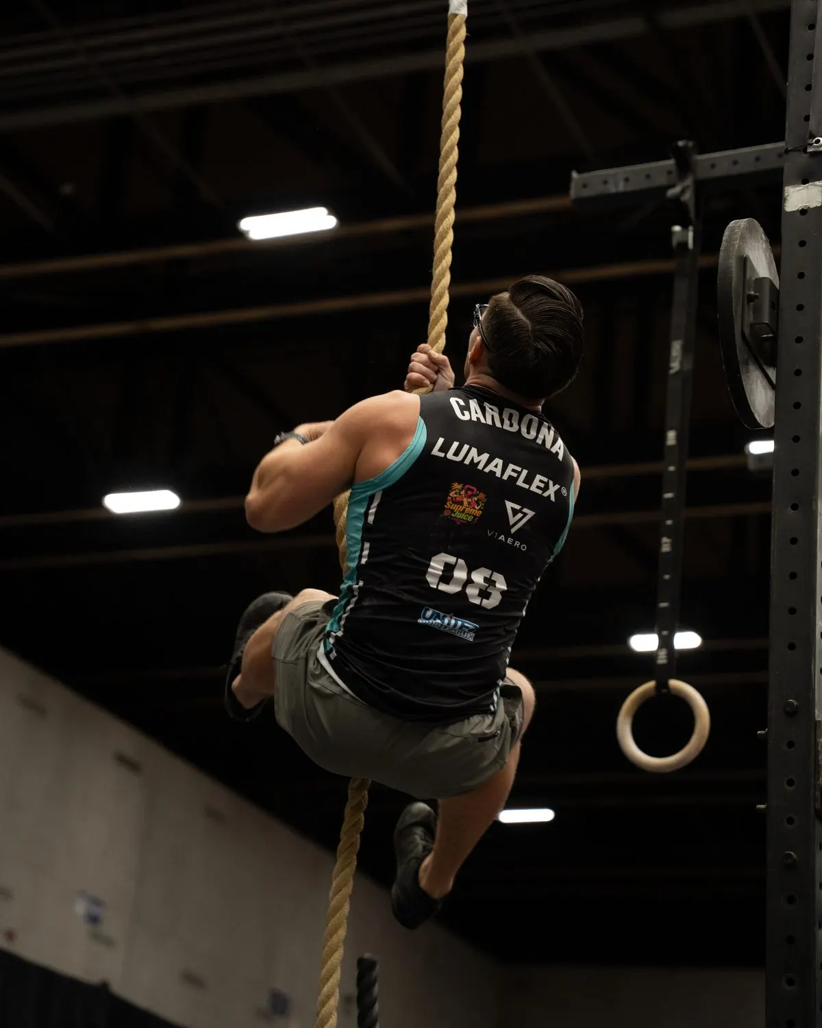Fort Lauderdale Lions player Eric Cardona climbs the rope in the Jack and Jill