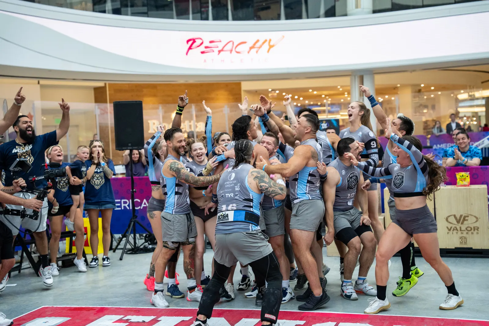 New York Wolves players celebrating together at the New York event