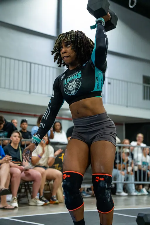 Janine Nicole dumbbell snatch