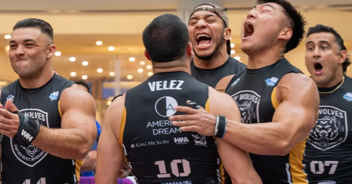 New York Wolves athletes celebrate on the competition floor at United Grid League Week 3 at American Dream.