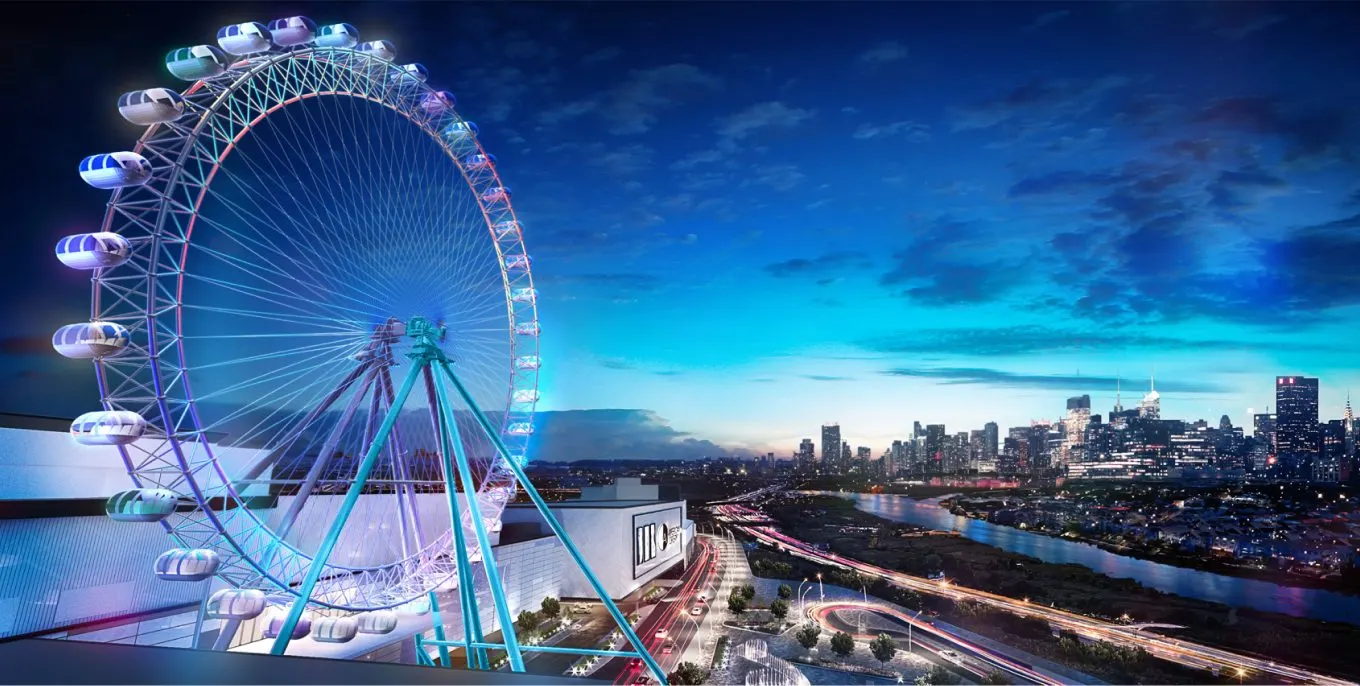 The Dream Wheel at American Dream with the Manhattan skyline behind it