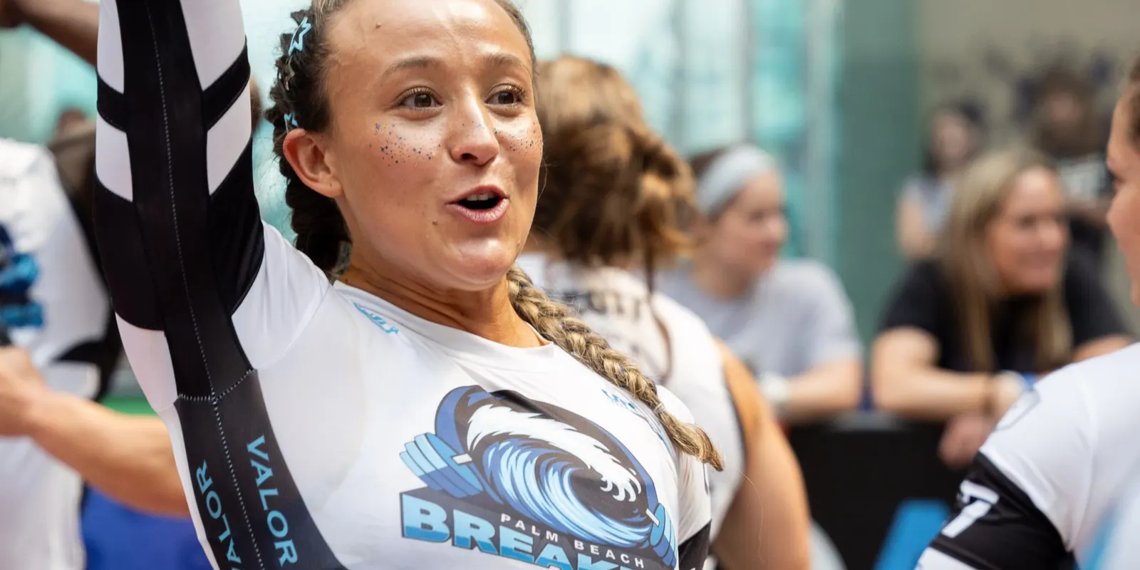 A Palm Beach Breakers athlete celebrates with an arm raised at United Grid League Week 3 at American Dream.