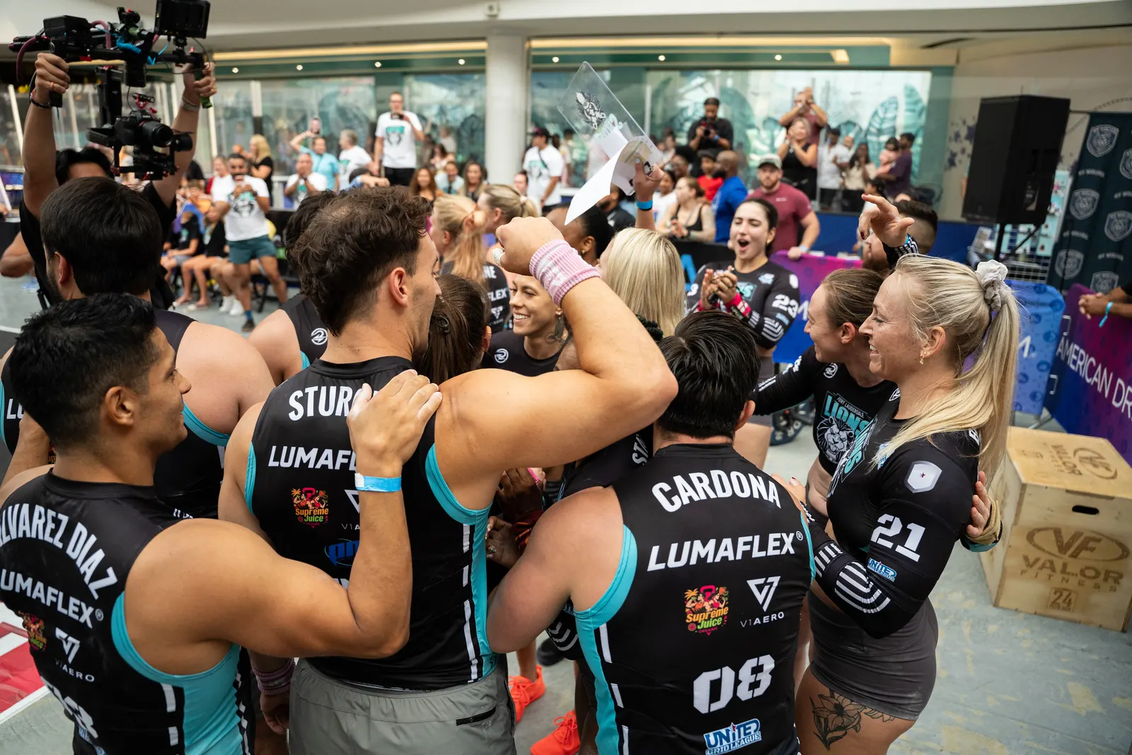 Fort Lauderdale Lions players celebrating together at the New York event