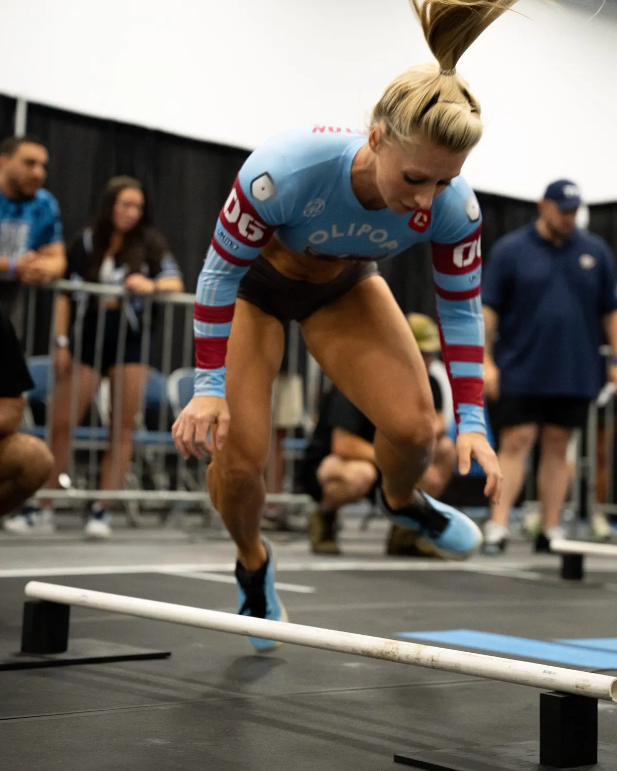 A Carolina Flight athlete jumps the bar on the Grid League playing surface during a race at Lakeland on June 20, 2026.