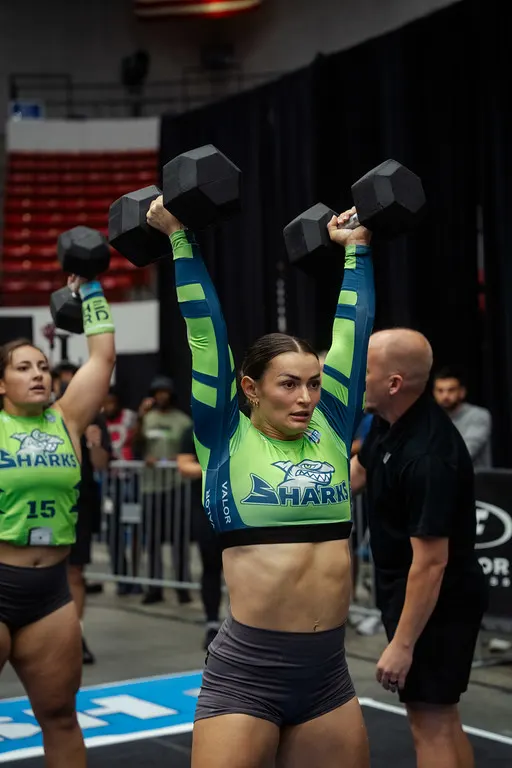Kyra Milligan dumbbell overhead