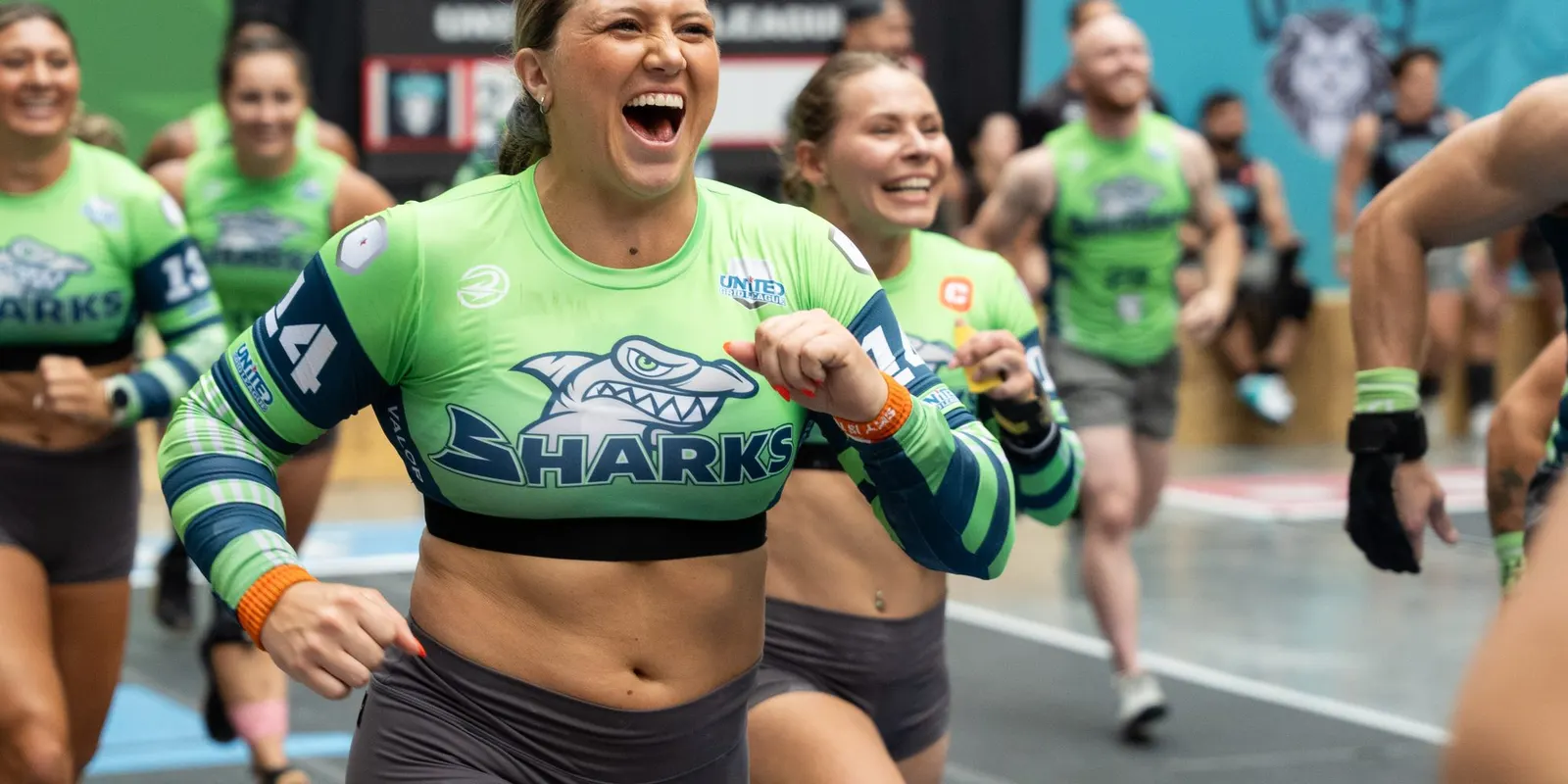 SWFL Sharks athletes run across the competition floor at United Grid League Week 3 at American Dream.