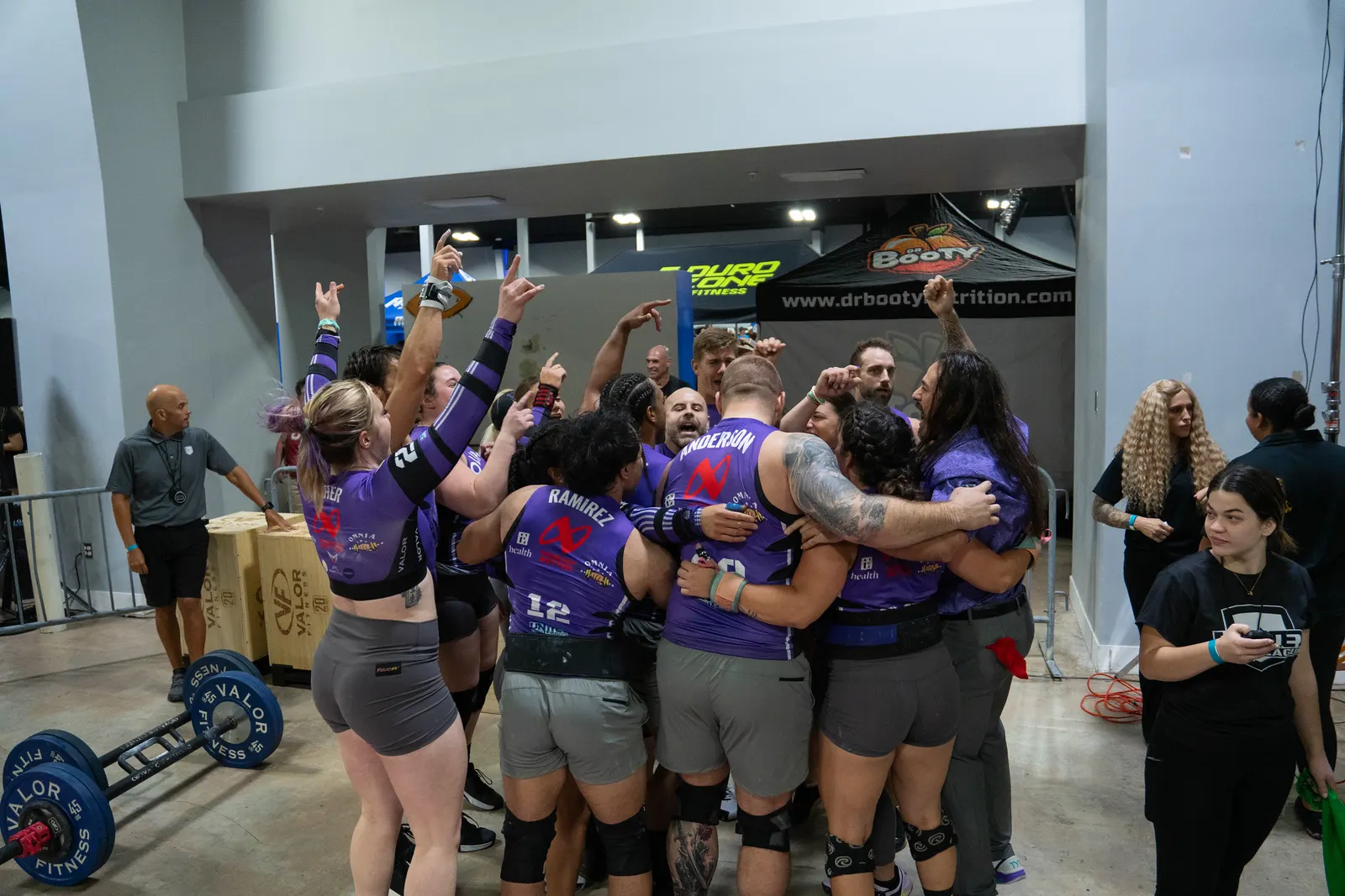 Las Vegas Venom players celebrating together with arms raised in Miami